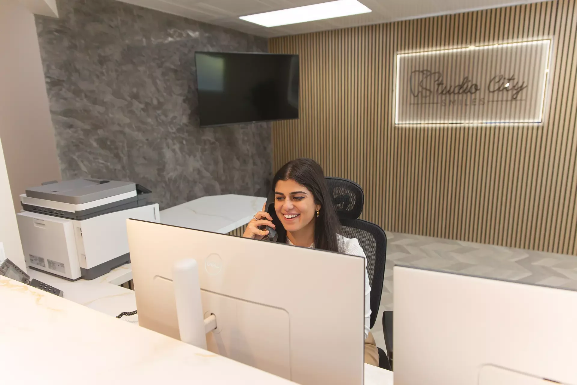 Our front desk team at Studio City Smiles